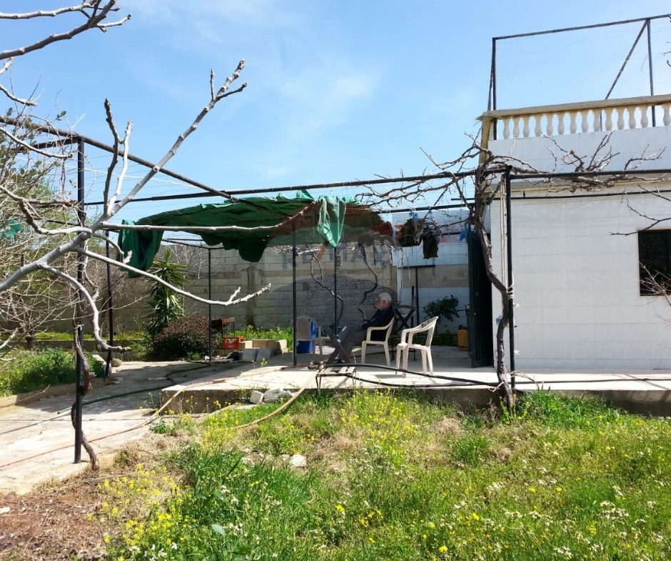 R9-613 Land for Sale in Qsair Akkar – 1,750 m²,Exclusive Price أرض للبيع في القصير عكار – 1,750 متر مربع، سعر حصري — Photo 12 of 13
