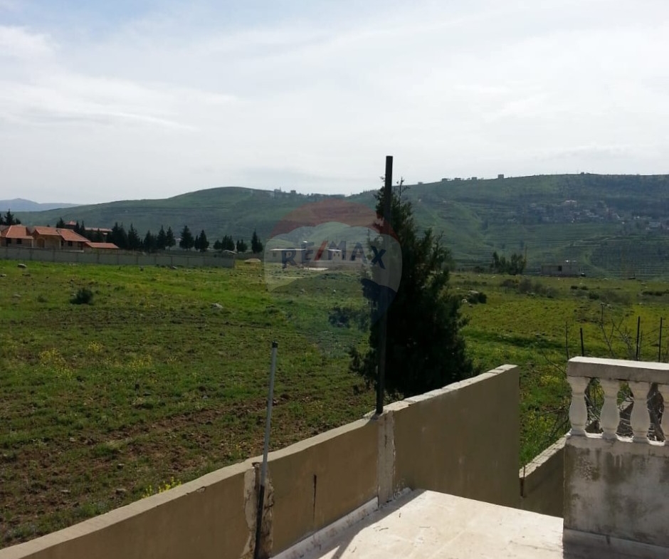 R9-613 Land for Sale in Qsair Akkar – 1,750 m²,Exclusive Price أرض للبيع في القصير عكار – 1,750 متر مربع، سعر حصري — Photo 3 of 13