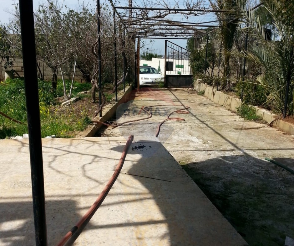 R9-613 Land for Sale in Qsair Akkar – 1,750 m²,Exclusive Price أرض للبيع في القصير عكار – 1,750 متر مربع، سعر حصري — Photo 4 of 13