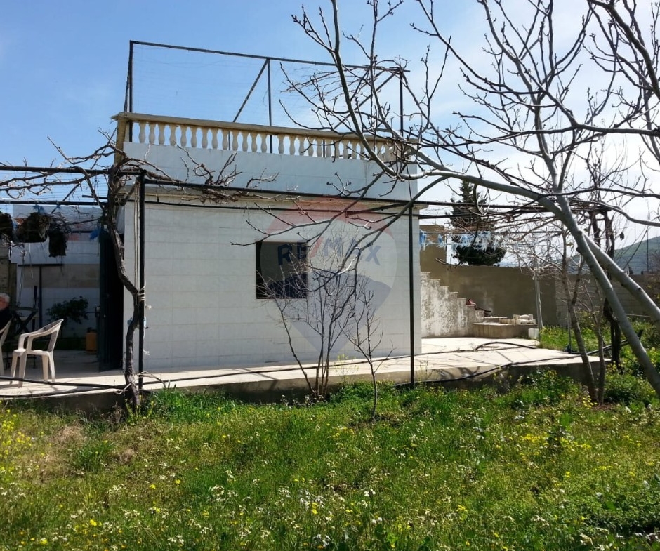 R9-613 Land for Sale in Qsair Akkar – 1,750 m²,Exclusive Price أرض للبيع في القصير عكار – 1,750 متر مربع، سعر حصري — Photo 7 of 13