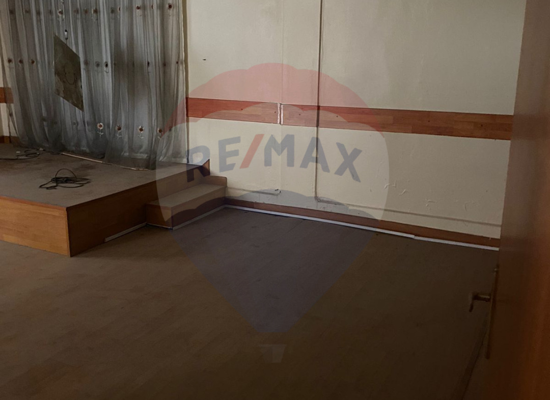 R9-1663 A strategically located property for sale in Zahriyeh, Tripoli, featuring a 142 sqm apartment and a 104 sqm shop with mezzanine. — الصورة 2 من 4