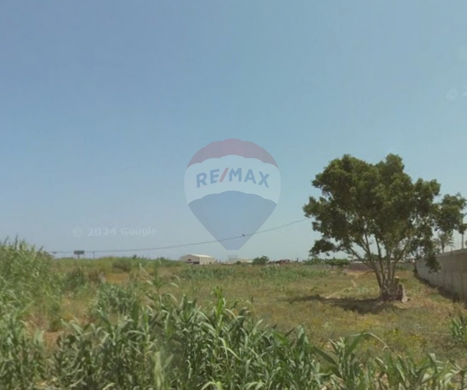 R9-2052 Residential Land for Sale in Basatin – Tripoli, 1,617 m², Up to 5 Floorsأرض سكنية للبيع في البساتين – طرابلس، 1,617 م²، تسمح ببناء حتى 5 — Photo 2 of 3