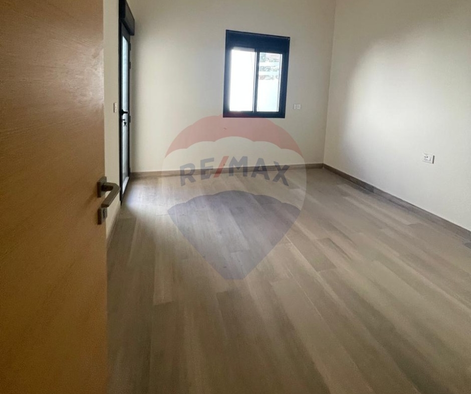 R9-2781 Lower-Ground Apartment with Panoramic Views in Balamand — Photo 3 of 9