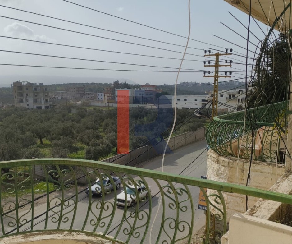 R9-3217 مبنى كامل للبيع في علما – زغرتا  (2444 م²، 3 طوابق، 5 شقق، 8 محلات) — الصورة 9 من 10