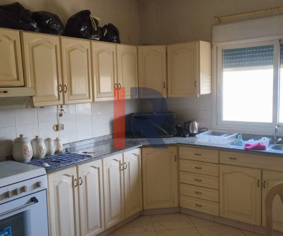 R9-3217 مبنى كامل للبيع في علما – زغرتا  (2444 م²، 3 طوابق، 5 شقق، 8 محلات) — الصورة 6 من 10