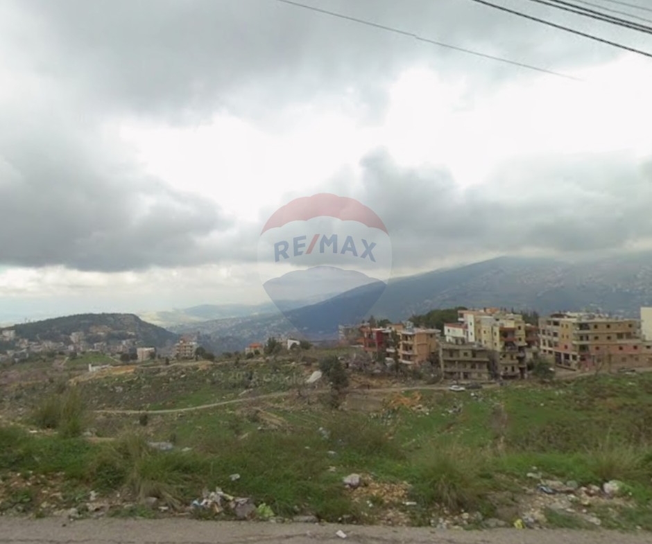 R9-3556 أرض للبيع في عاصون الضنية – 2100 م² — الصورة 2 من 2
