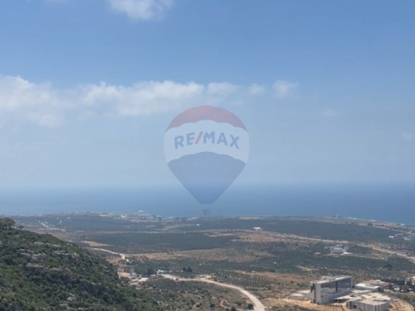 R9-3781فيلا للبيع في دده الكورة – مساحة بناء 1,600 م²، أرض 1,000 م²، إطلالة بانورامية بحرية وجبلية — الصورة 2 من 13