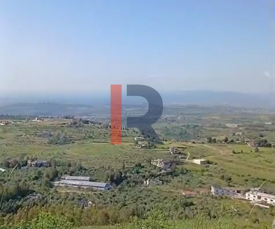 R9-3678 Two Lands for Sale in Bireh – Akkar, 2 Connected Plots, 5500 m² Each, Panoramic View قطعتا أرض متصلتان للبيع في بيريه عكار، 5500 م² لكل واحدة، إطلالة بانورامية — Photo 2 of 3