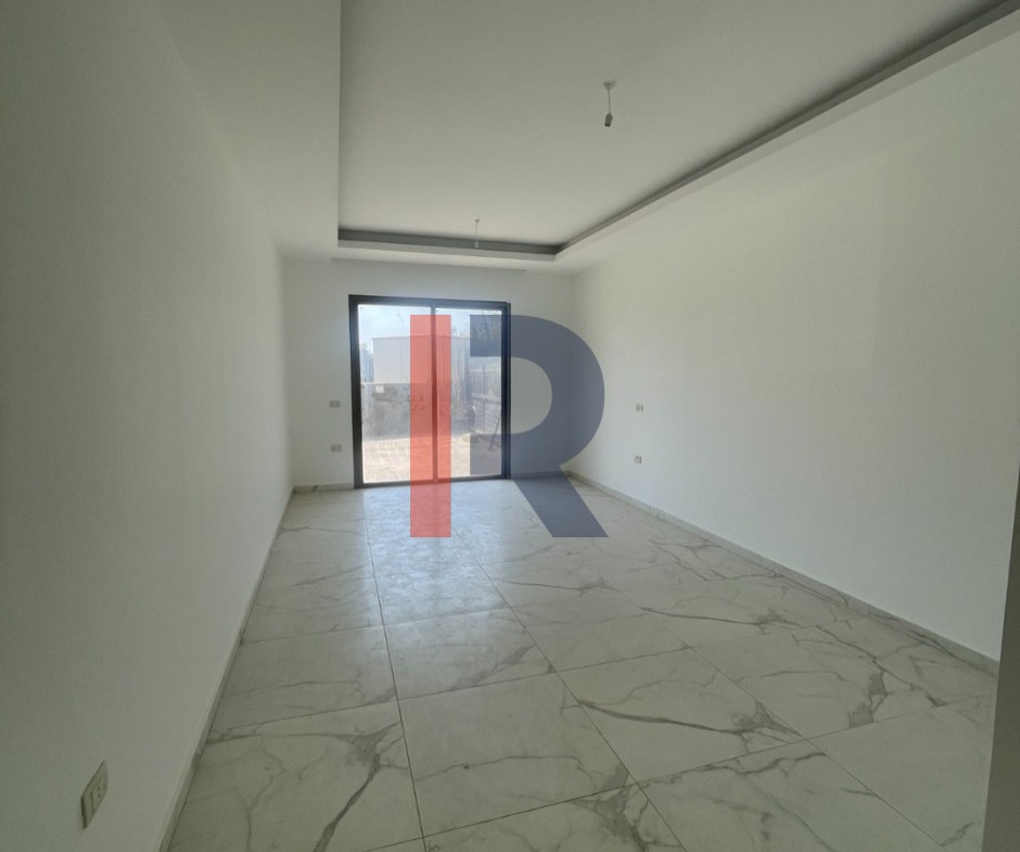 R9-3797 Apartment for Sale in Haykaliyeh – Koura, 140 m², Floor -1 شقة للبيع في هيكلية الكورة – 140 م²، الطابق تحت الأرض (-1) — Photo 2 of 9