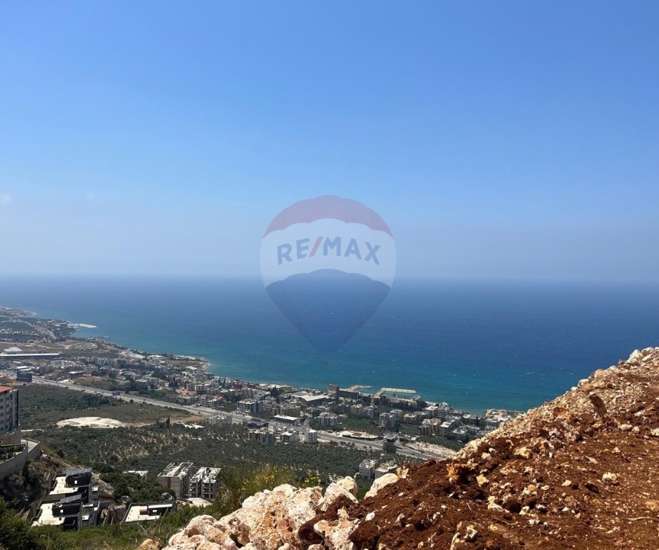 R9-3961 أرض سكنية 1200م² للبيع في دده الكورة | إطلالة بحرية وجبلية — الصورة 4 من 4