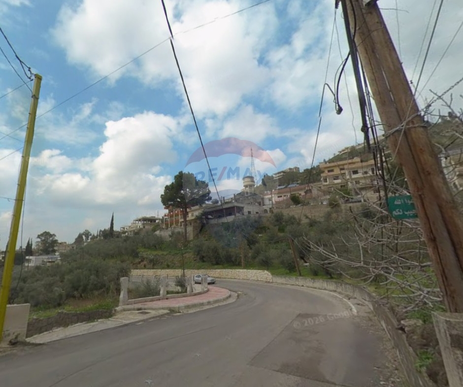 R9-4020 Land for Sale in Beit El Hajj Akkar | 2,309 m² | 100m Main Road Frontageأرض للبيع في بيت الحاج عكار | 2,309 م² | واجهة 100 متر على الطريق العام — Photo 2 of 3