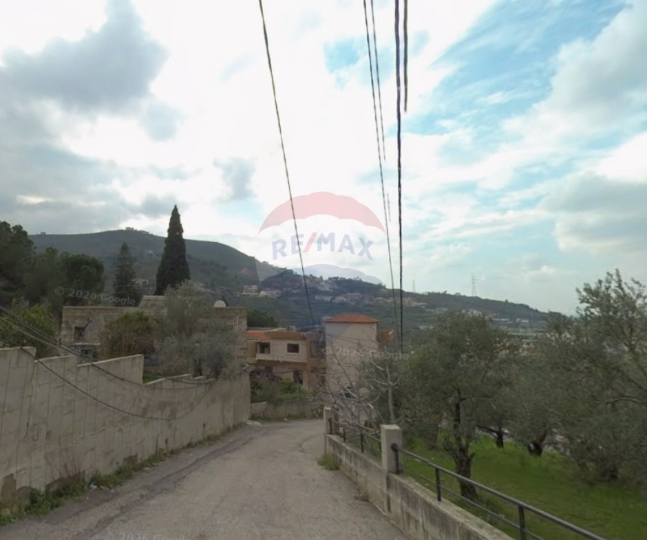 R9-4020 Land for Sale in Beit El Hajj Akkar | 2,309 m² | 100m Main Road Frontageأرض للبيع في بيت الحاج عكار | 2,309 م² | واجهة 100 متر على الطريق العام — Photo 3 of 3